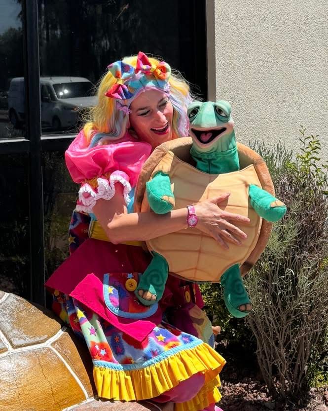 Miss Fairy G leading birthday activities